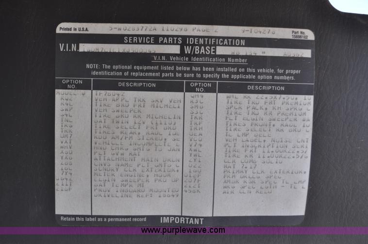 image for item F2050 1999 GMC T7500 Elgin street sweeper