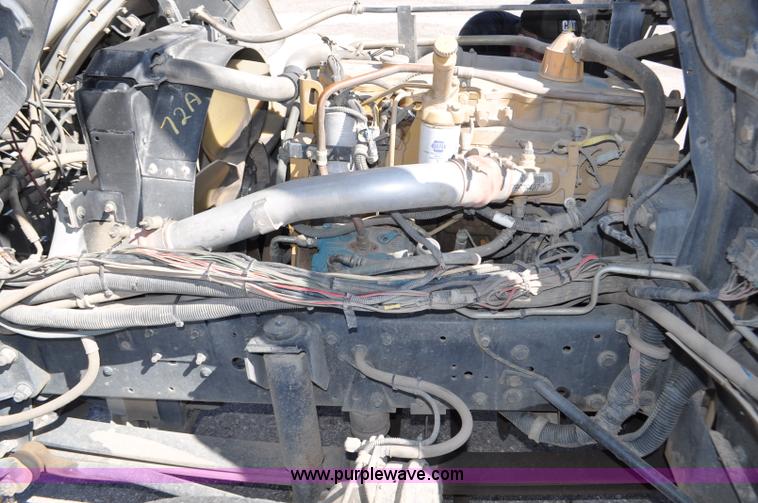 image for item F2050 1999 GMC T7500 Elgin street sweeper