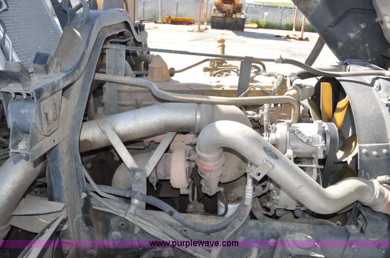 image for item F2050 1999 GMC T7500 Elgin street sweeper