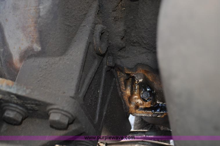 image for item F2050 1999 GMC T7500 Elgin street sweeper