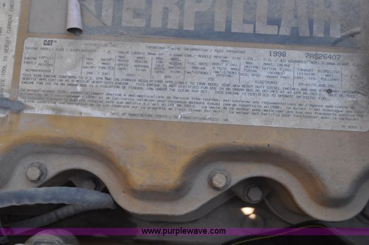 image for item F2050 1999 GMC T7500 Elgin street sweeper