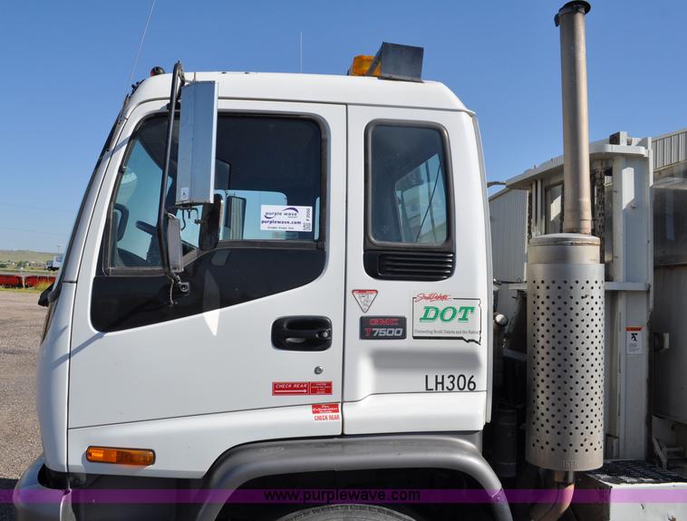 image for item F2050 1999 GMC T7500 Elgin street sweeper