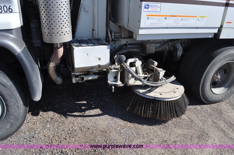 image for item F2050 1999 GMC T7500 Elgin street sweeper
