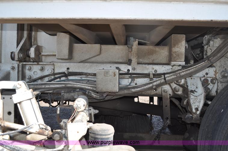 image for item F2050 1999 GMC T7500 Elgin street sweeper