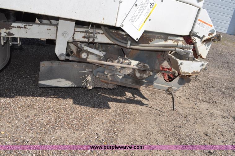 image for item F2050 1999 GMC T7500 Elgin street sweeper