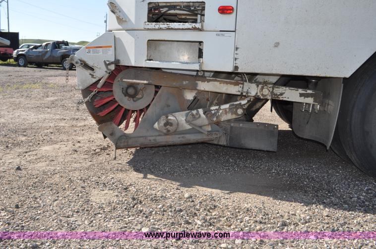 image for item F2050 1999 GMC T7500 Elgin street sweeper