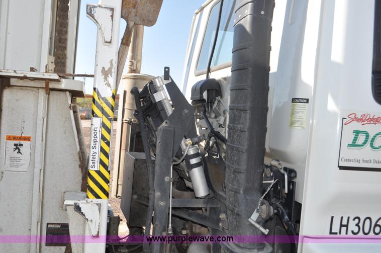 image for item F2050 1999 GMC T7500 Elgin street sweeper