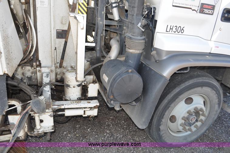 image for item F2050 1999 GMC T7500 Elgin street sweeper