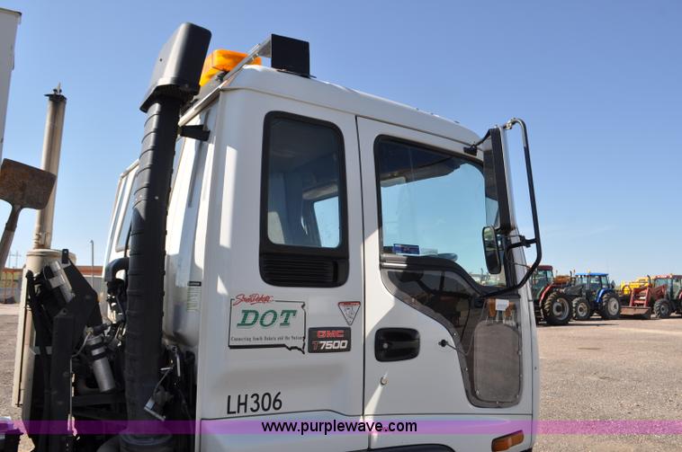 image for item F2050 1999 GMC T7500 Elgin street sweeper