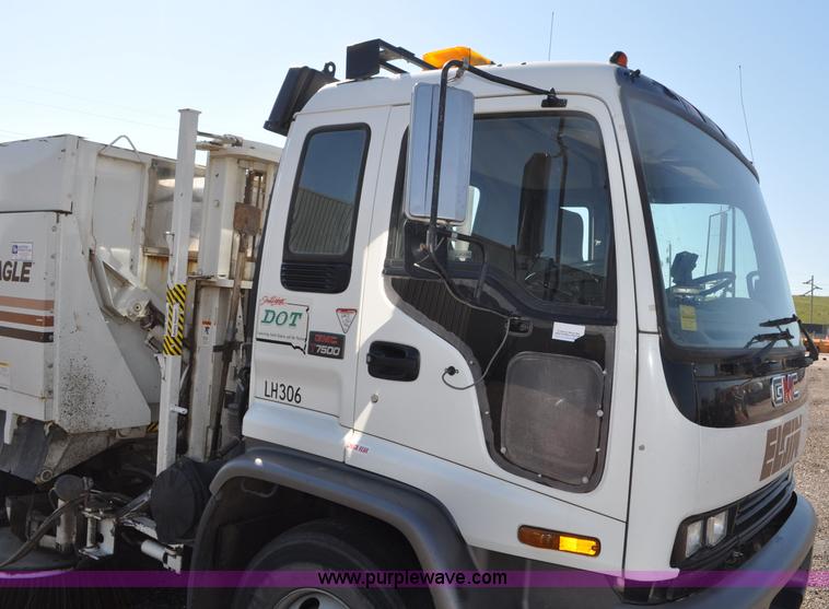 image for item F2050 1999 GMC T7500 Elgin street sweeper
