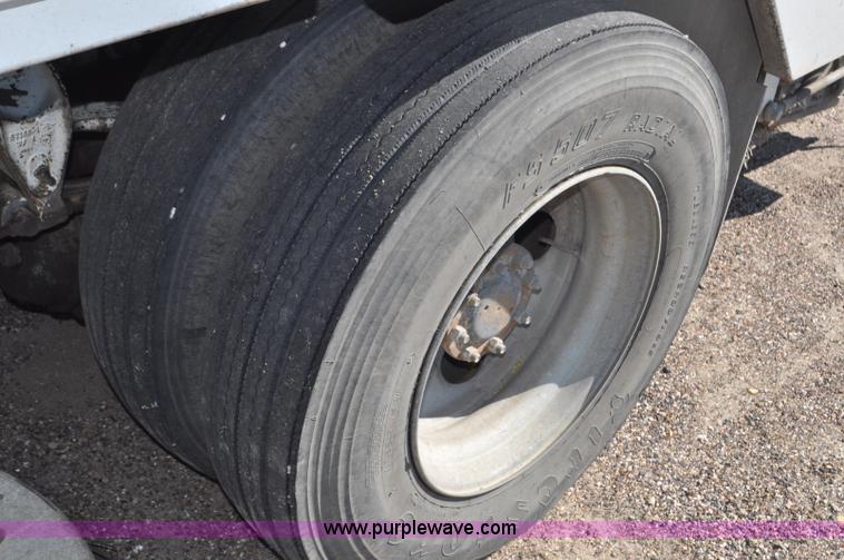 image for item F2050 1999 GMC T7500 Elgin street sweeper