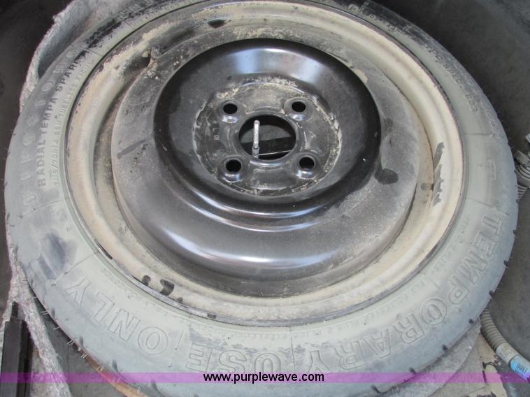 image for item F7461 2003 Saturn ION Quad Coupe 3