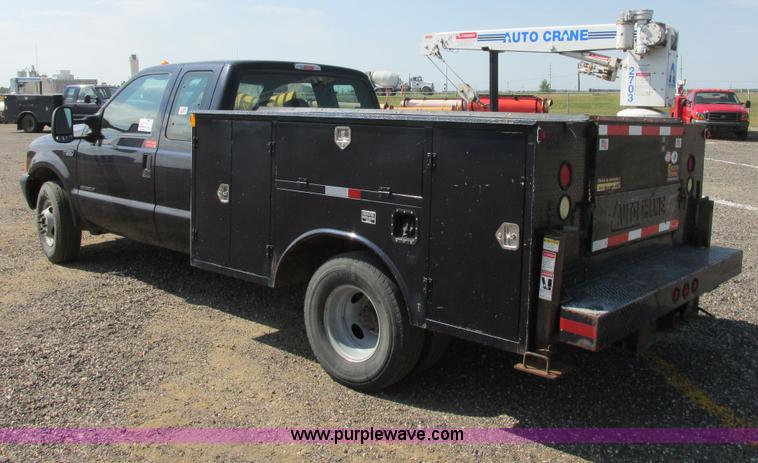image for item I6216 2000 Ford F350 Super Duty XL SuperCab service truck with crane