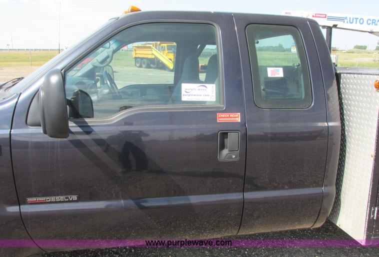 image for item I6216 2000 Ford F350 Super Duty XL SuperCab service truck with crane