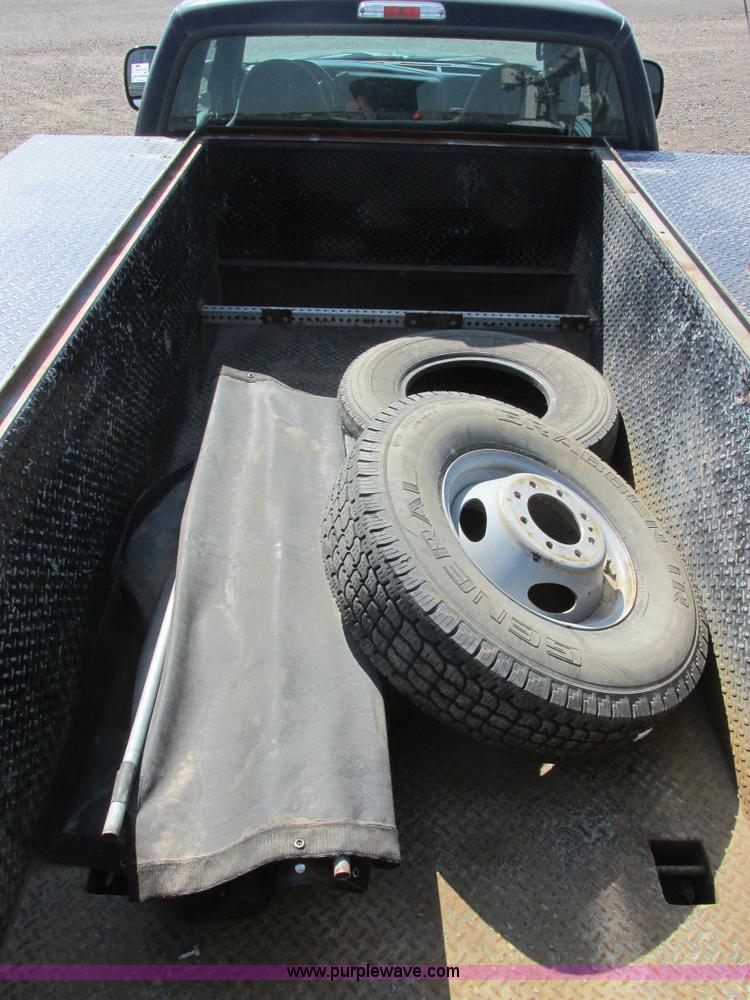 image for item I6216 2000 Ford F350 Super Duty XL SuperCab service truck with crane