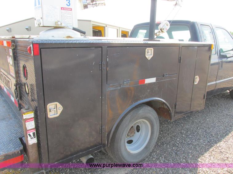 image for item I6216 2000 Ford F350 Super Duty XL SuperCab service truck with crane