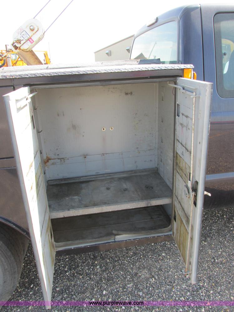 image for item I6216 2000 Ford F350 Super Duty XL SuperCab service truck with crane