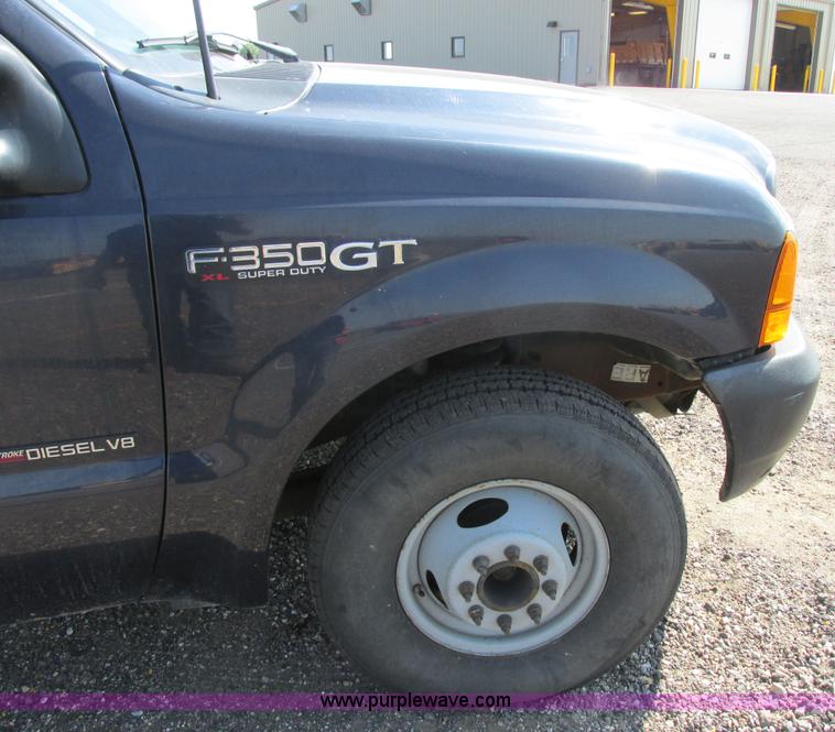 image for item I6216 2000 Ford F350 Super Duty XL SuperCab service truck with crane