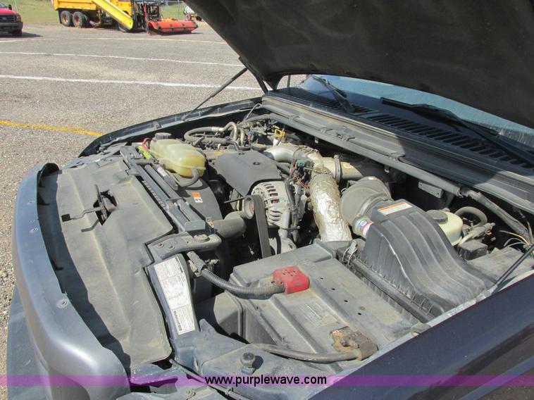 image for item I6216 2000 Ford F350 Super Duty XL SuperCab service truck with crane