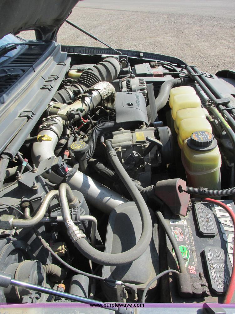 image for item I6216 2000 Ford F350 Super Duty XL SuperCab service truck with crane