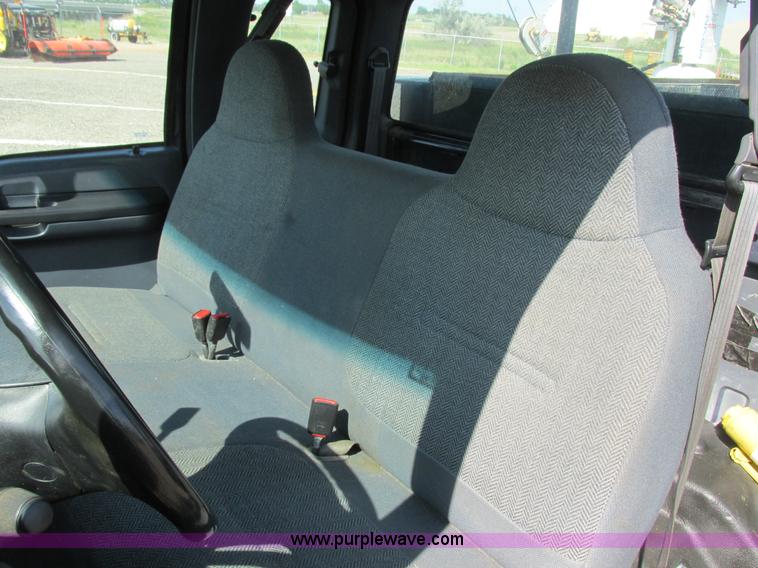 image for item I6216 2000 Ford F350 Super Duty XL SuperCab service truck with crane