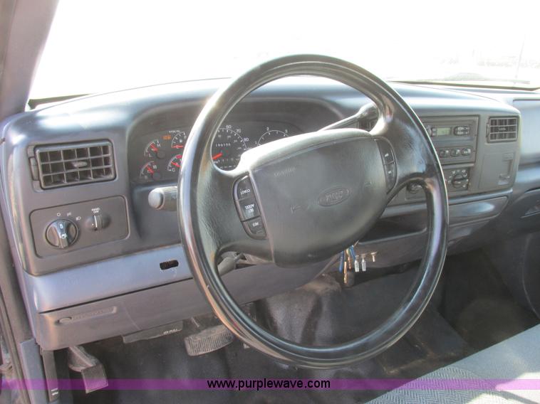 image for item I6216 2000 Ford F350 Super Duty XL SuperCab service truck with crane