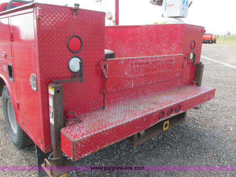 image for item I6217 2000 Ford F350 Super Duty XL SuperCab service truck with crane