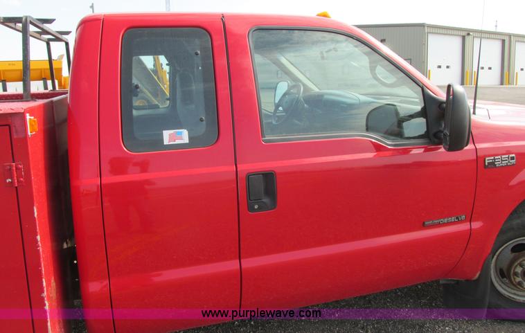 image for item I6217 2000 Ford F350 Super Duty XL SuperCab service truck with crane