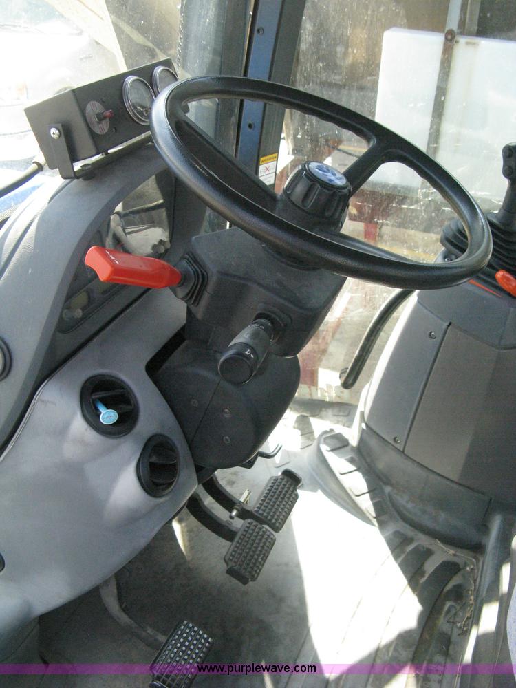 image for item H5310 2004 New Holland TS100A tractor