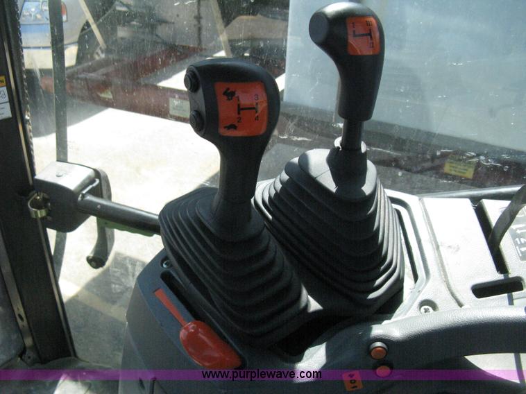 image for item H5310 2004 New Holland TS100A tractor