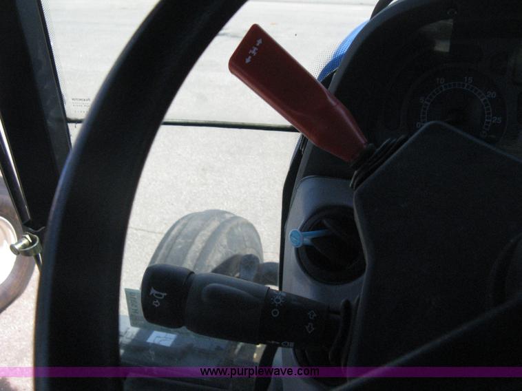 image for item H5310 2004 New Holland TS100A tractor