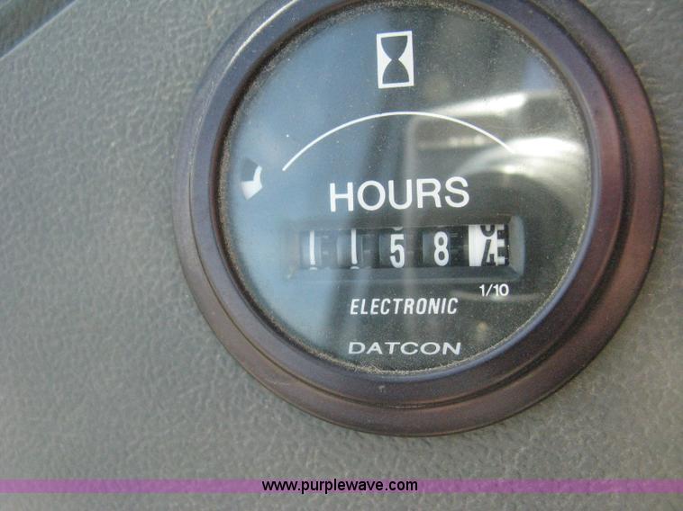 image for item H5310 2004 New Holland TS100A tractor