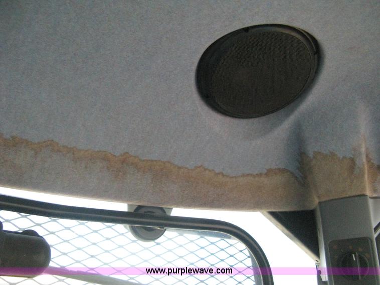 image for item H5310 2004 New Holland TS100A tractor