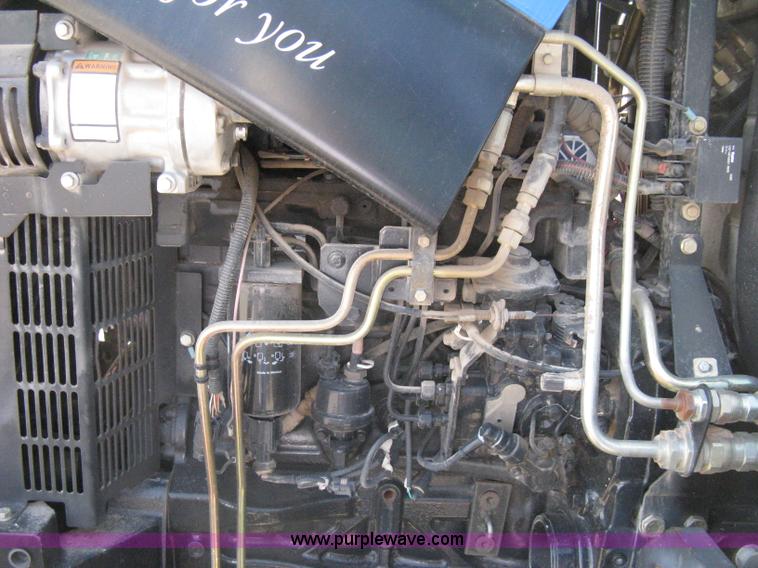 image for item H5310 2004 New Holland TS100A tractor