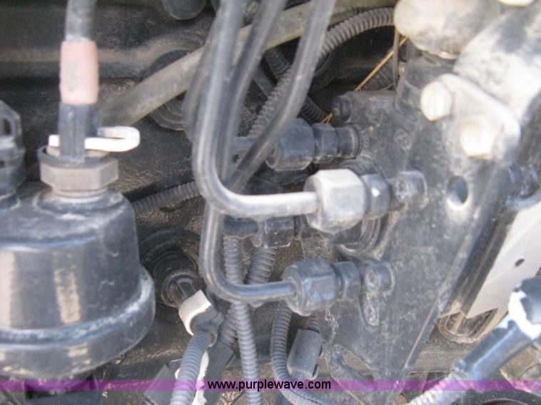 image for item H5310 2004 New Holland TS100A tractor