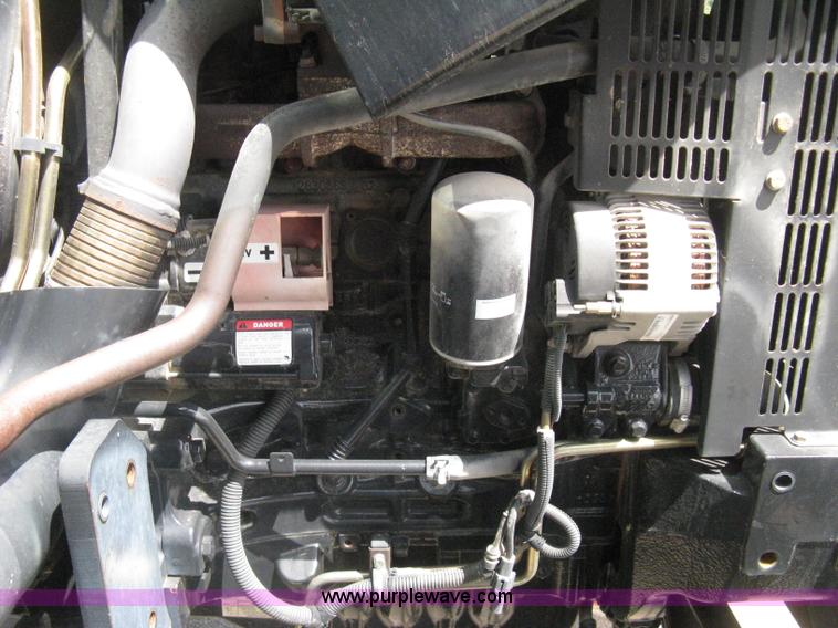 image for item H5310 2004 New Holland TS100A tractor