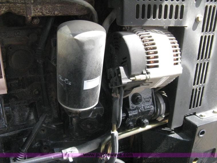 image for item H5310 2004 New Holland TS100A tractor