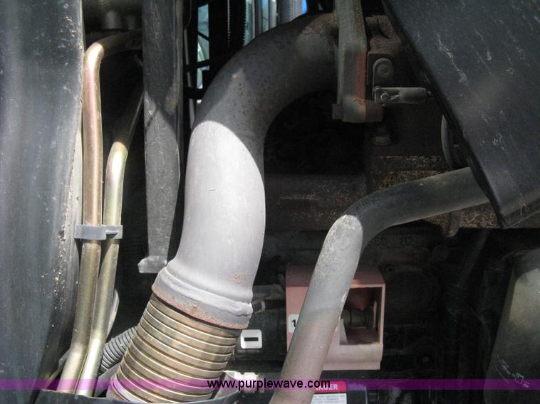 image for item H5310 2004 New Holland TS100A tractor