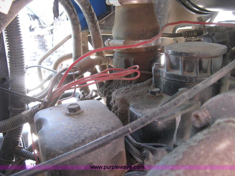 image for item H5310 2004 New Holland TS100A tractor