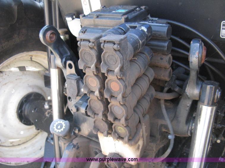 image for item H5310 2004 New Holland TS100A tractor