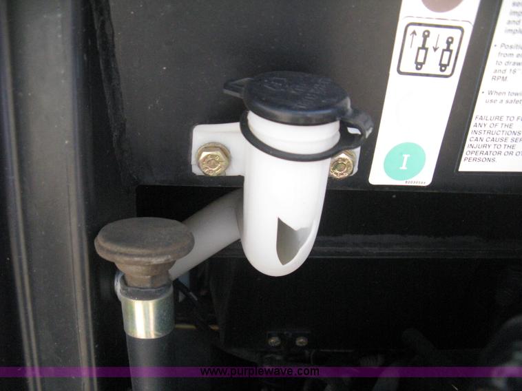 image for item H5310 2004 New Holland TS100A tractor