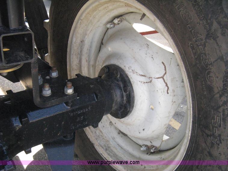 image for item H5310 2004 New Holland TS100A tractor