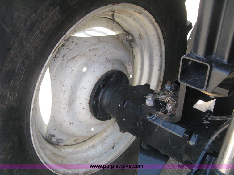 image for item H5310 2004 New Holland TS100A tractor