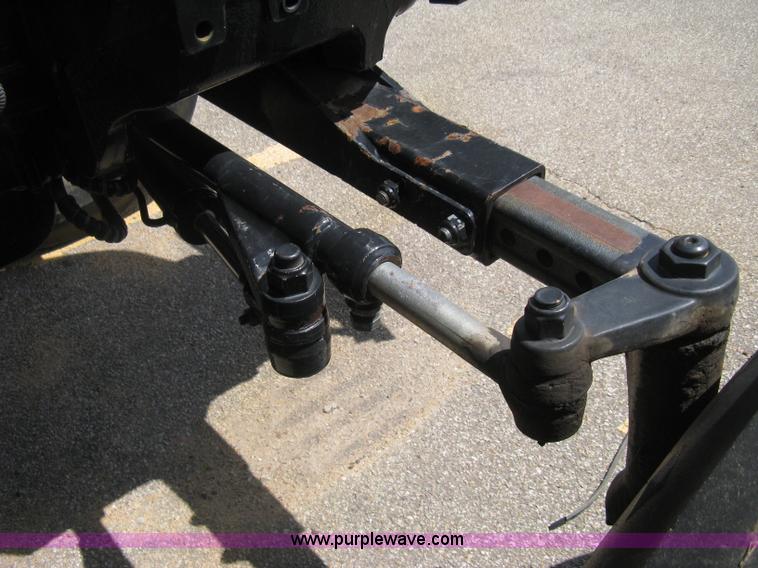 image for item H5310 2004 New Holland TS100A tractor