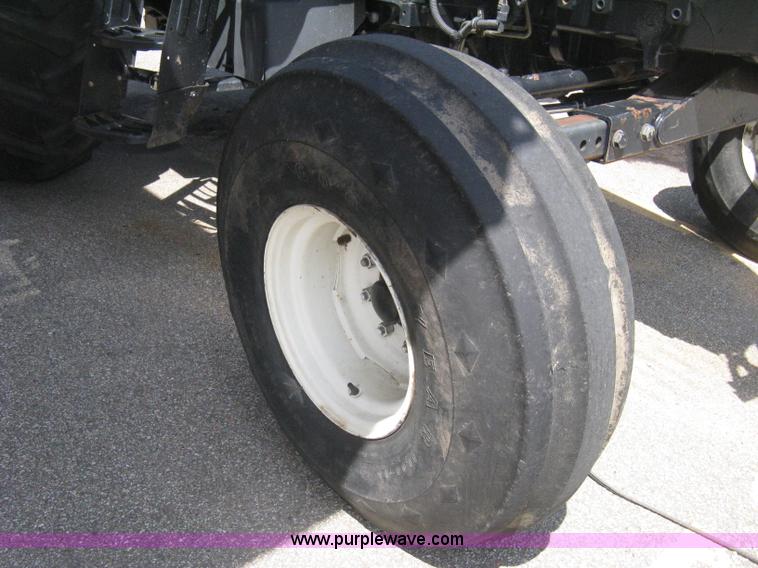 image for item H5310 2004 New Holland TS100A tractor