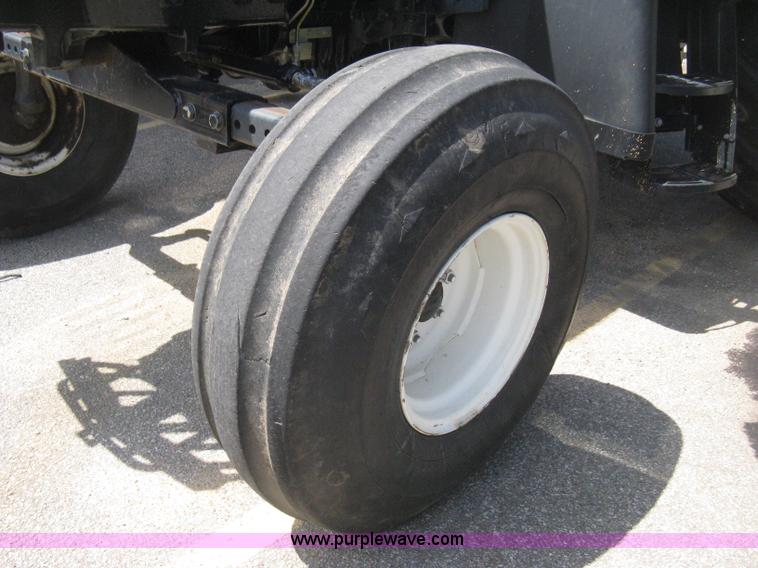 image for item H5310 2004 New Holland TS100A tractor