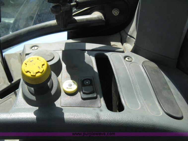 image for item H5311 2004 New Holland TS100A Plus tractor