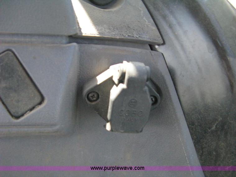 image for item H5311 2004 New Holland TS100A Plus tractor