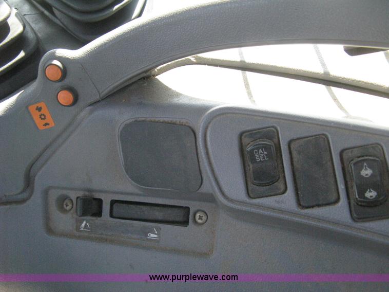 image for item H5311 2004 New Holland TS100A Plus tractor