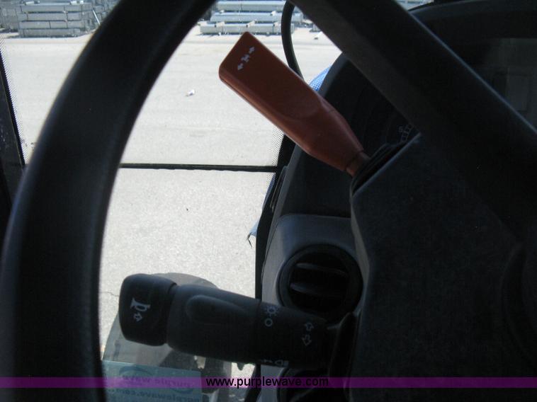 image for item H5311 2004 New Holland TS100A Plus tractor